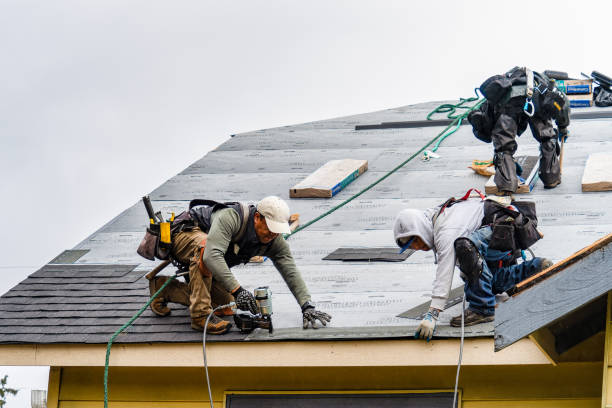 Professional Storm Damage Roof Repair technician working in Southborough, MA